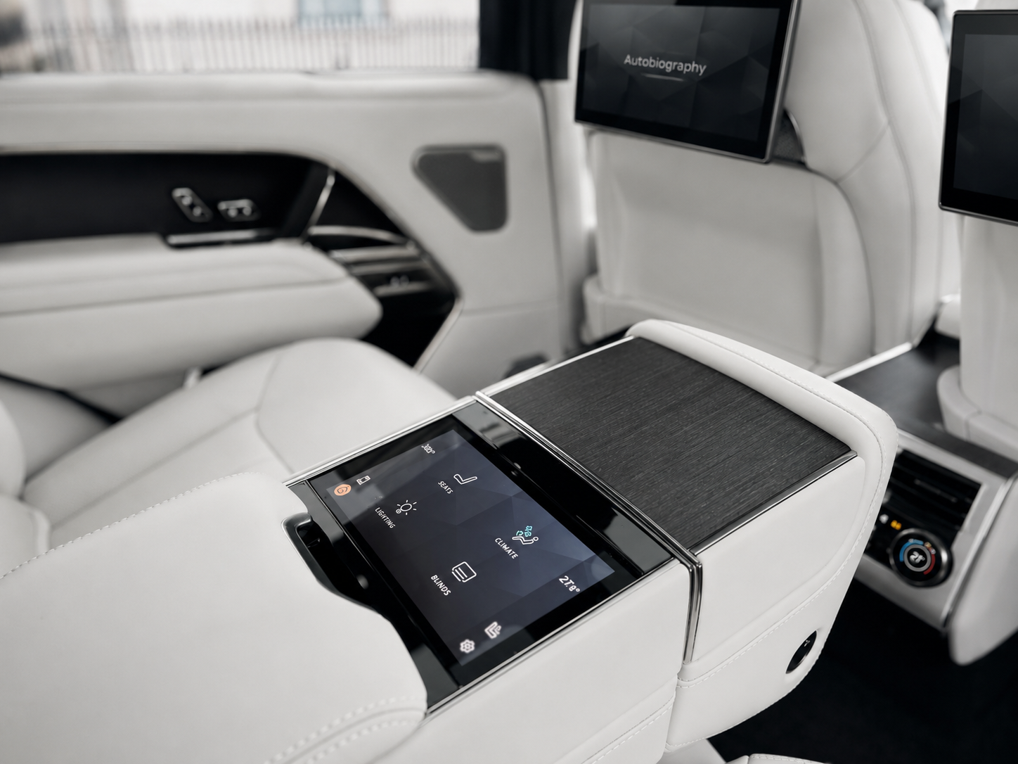 Range Rover Autobiography LWB rear passenger cabin with white leather seating and executive comfort features